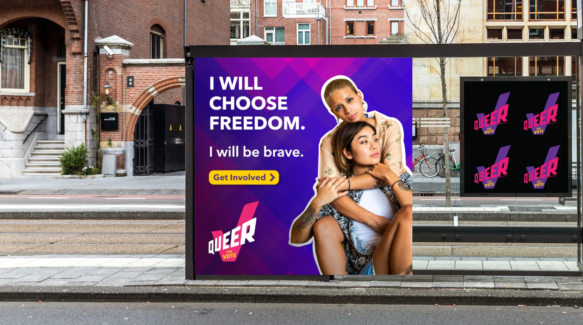 A bus stop with Queer the Vote campaign ads on it.